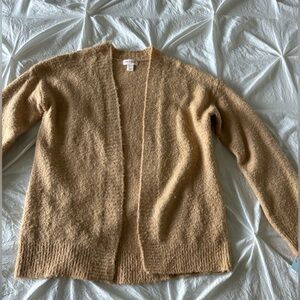 Tan cardigan never worn children’s Large selling for $15.00